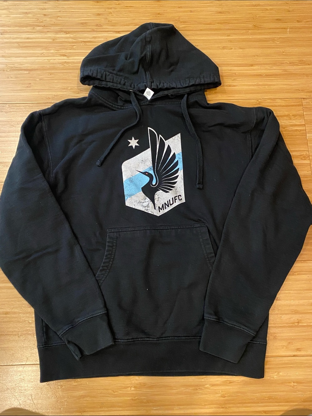 MN United Black Hooded Pullover Sweatshirt with Crest Graphic